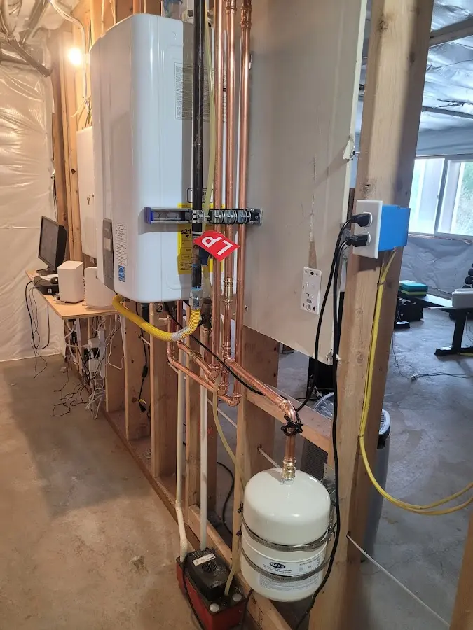 Licensed plumber repairing a kitchen sink in Pikeville